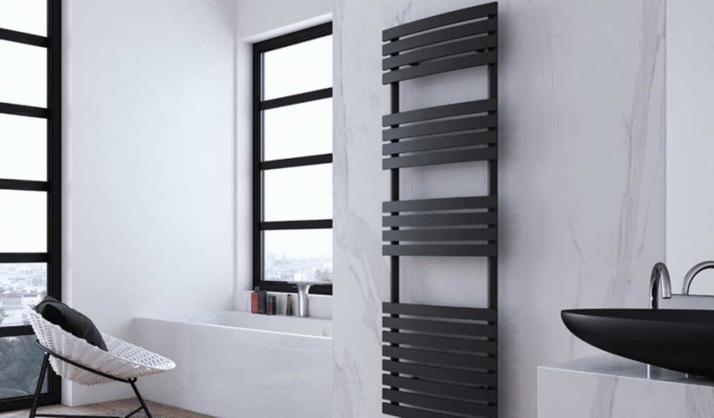 Black towel rail in a white and black bathroom