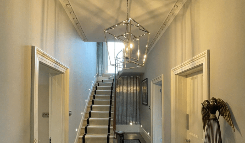 Luxury Hallway with stairway lighting and pendant